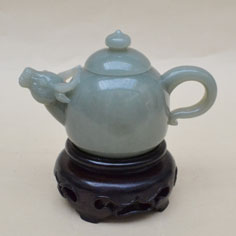 白玉籽《牛壺》